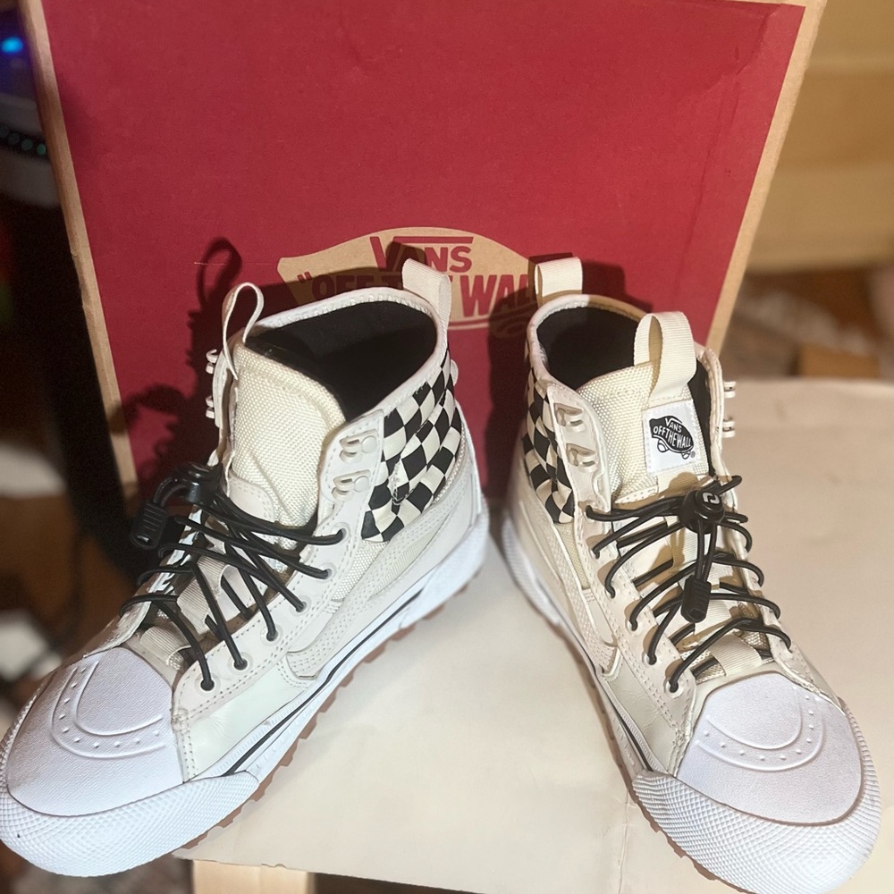 Vans High-Top Sneakers with Black and White Checkered Design